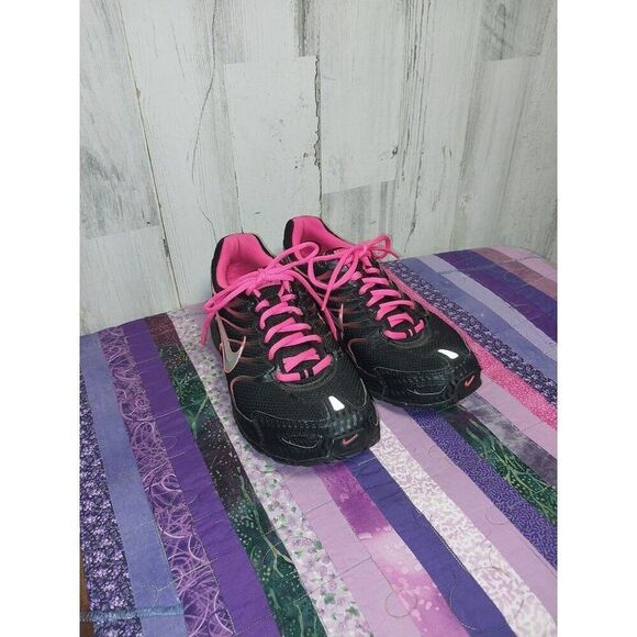 Nike Air Max  Woman’s Shoes Torch 4 Running Black Pink Sneakers SZ 9 US - Picture 1 of 13